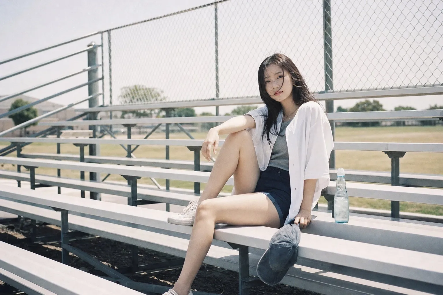 Film idol on baseball bleachers